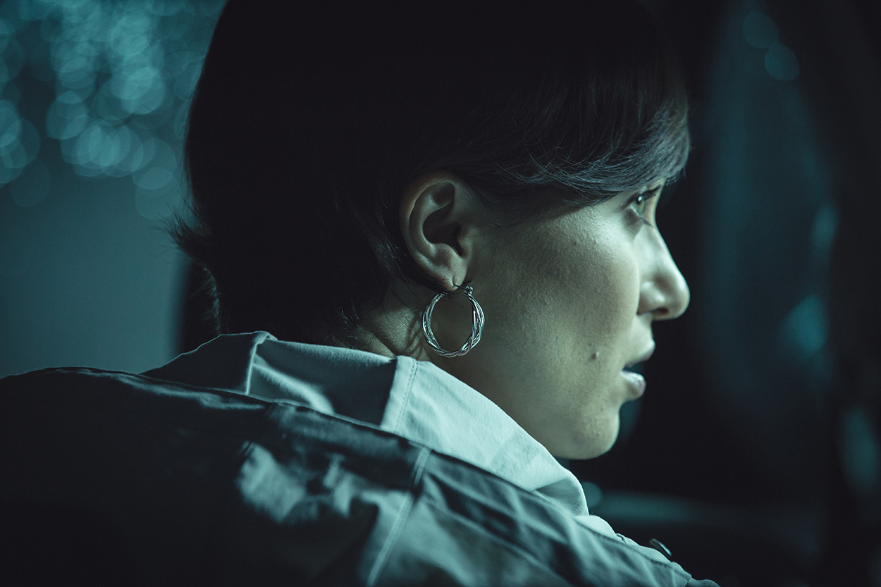 woman looking over her shoulder